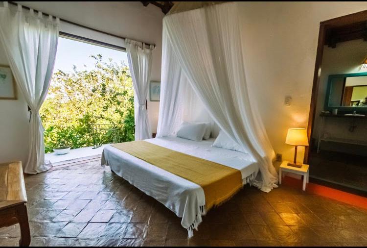 Bed and Breakfast Espelho Bahia Blue House Прая-ду-Эспелью Экстерьер фото